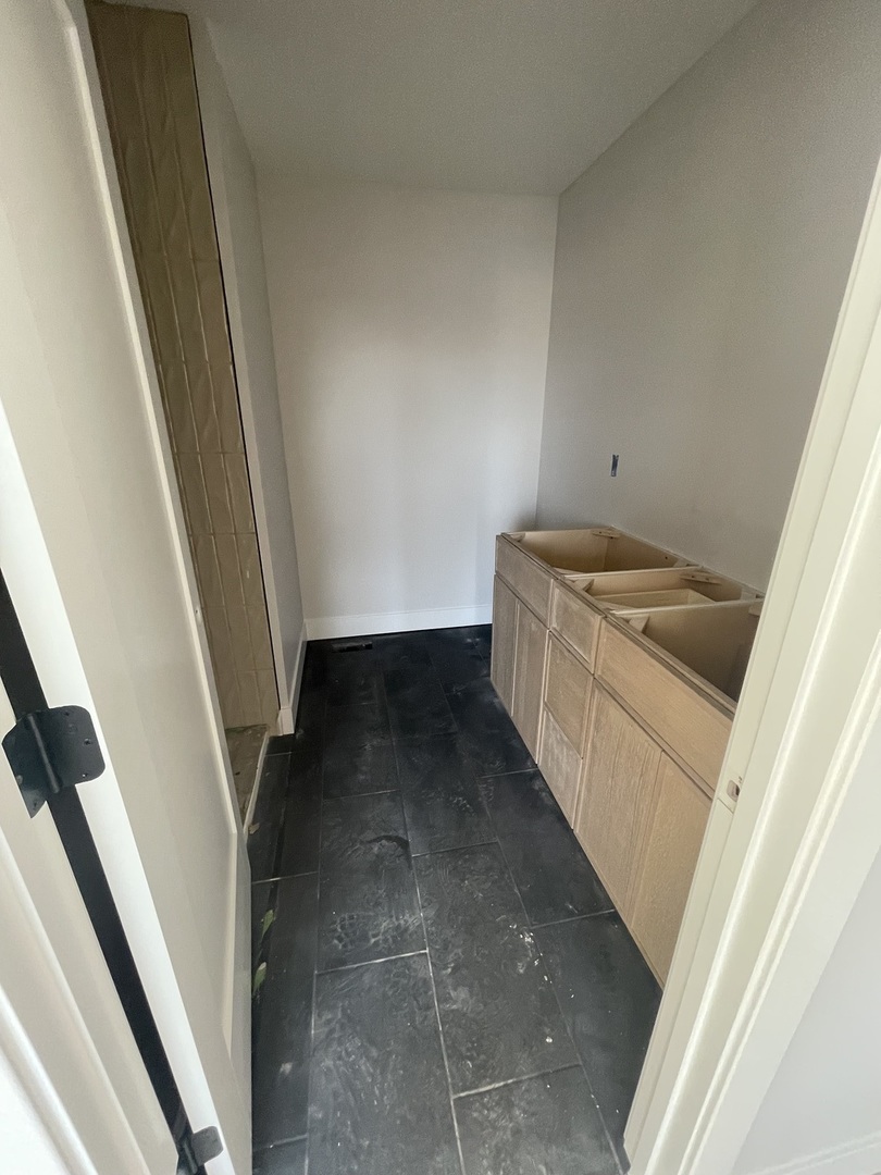 1525 Belclare Road Normal, IL 61761 - Photo 9 of 10 a storage room with a sink