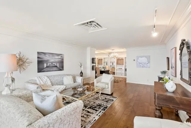 a view of a livingroom with furniture and window