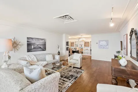 a view of a livingroom with furniture and window