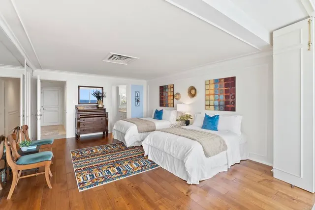 a view of a large kitchen with a large window