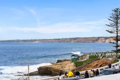 a en suite bathroom with a sink and a mirror