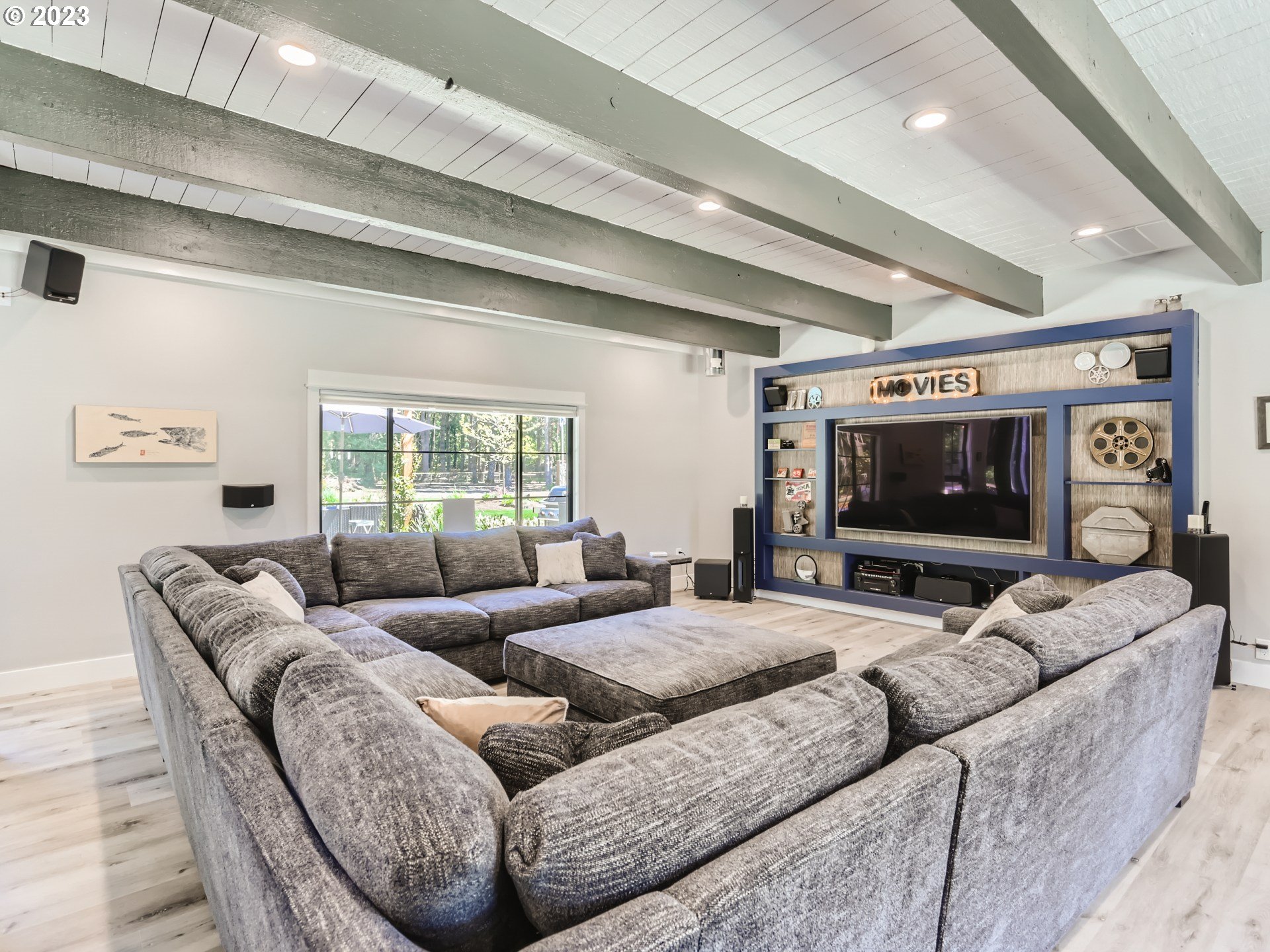 15631 Northeast Becke Road Aurora, OR 97002 - Photo 14 of 47 a living room with furniture and a flat screen tv