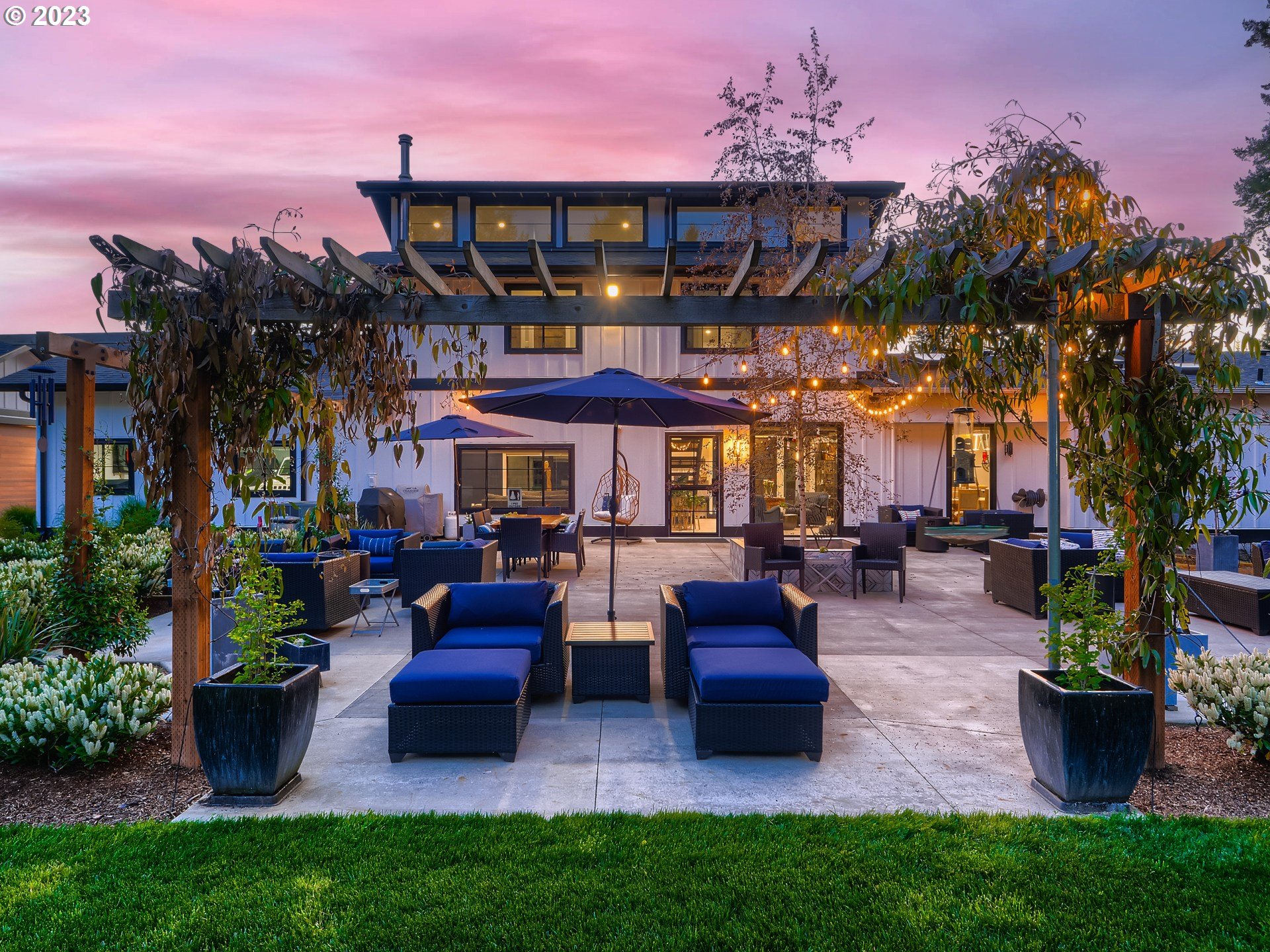 15631 Northeast Becke Road Aurora, OR 97002 - Photo 36 of 47 a front view of a house with a garden and patio
