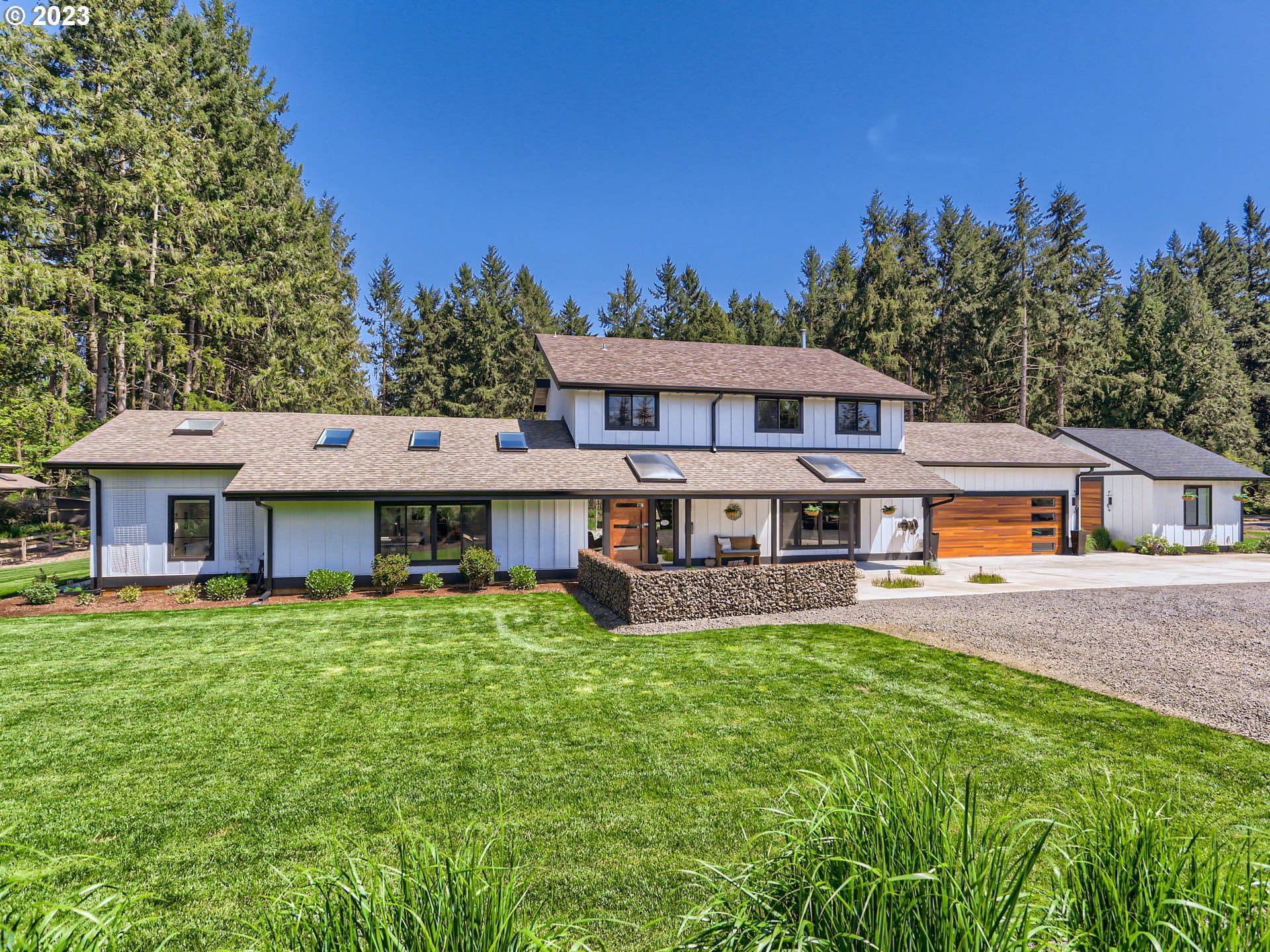 15631 Northeast Becke Road Aurora, OR 97002 - Photo 4 of 47 a view of a house with pool and a yard