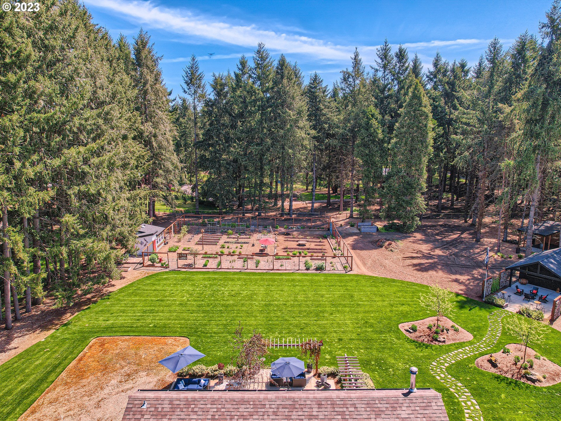 15631 Northeast Becke Road Aurora, OR 97002 - Photo 44 of 47 a view of yard with seating area and trees around
