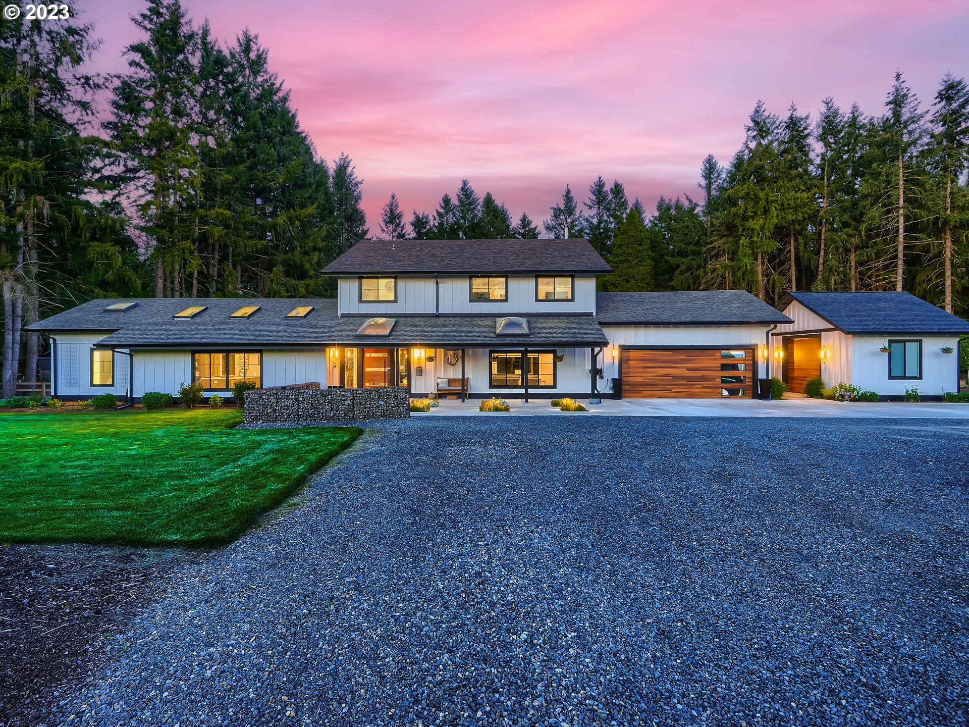 15631 Northeast Becke Road Aurora, OR 97002 - Photo 6 of 47 a front view of a house with swimming pool and yard