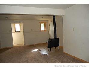 172 Alpine Road Dillon, CO 80435 - Photo 14 of 18 a living room with a couch and a window