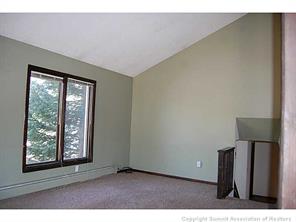 172 Alpine Road Dillon, CO 80435 - Photo 4 of 18 a view of an empty room with a window