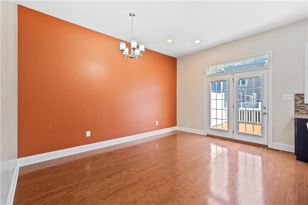 337 Osana Lane Mars, PA 16046 - Photo 11 of 34 an empty room with wooden floor and windows