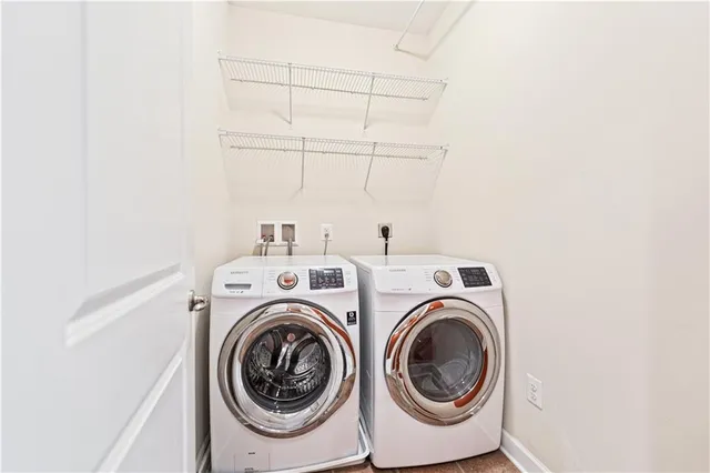 a utility room with dryer and washer