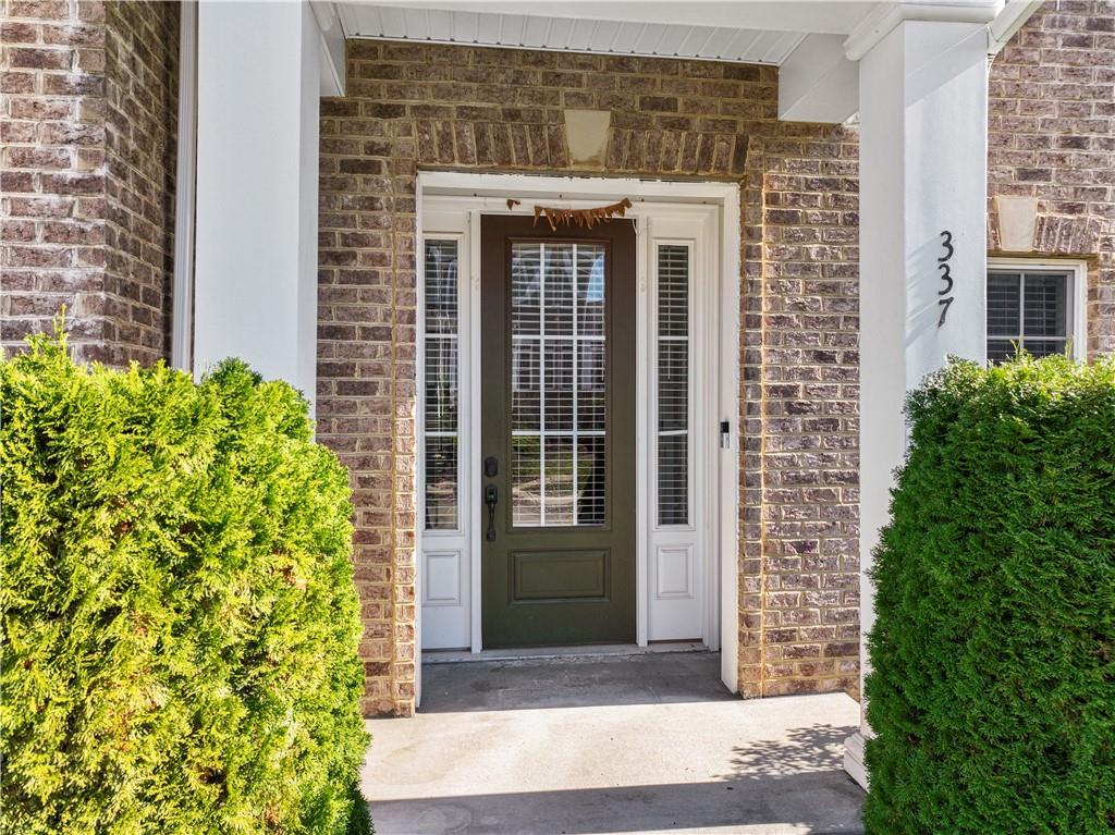 337 Osana Lane Mars, PA 16046 - Photo 3 of 34 a front view of a house with a yard
