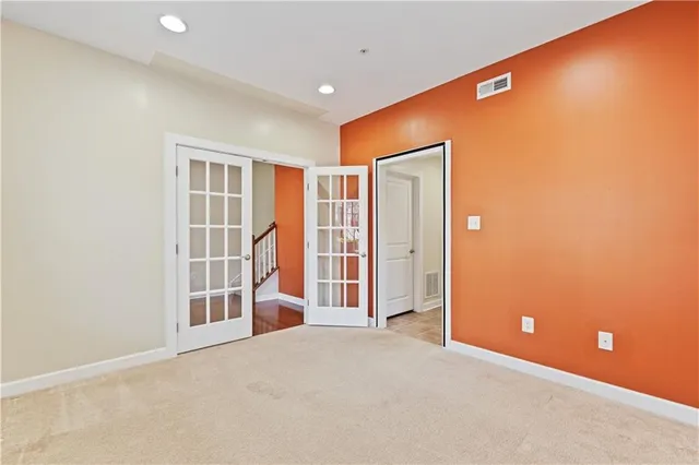 an empty room with entrance and door