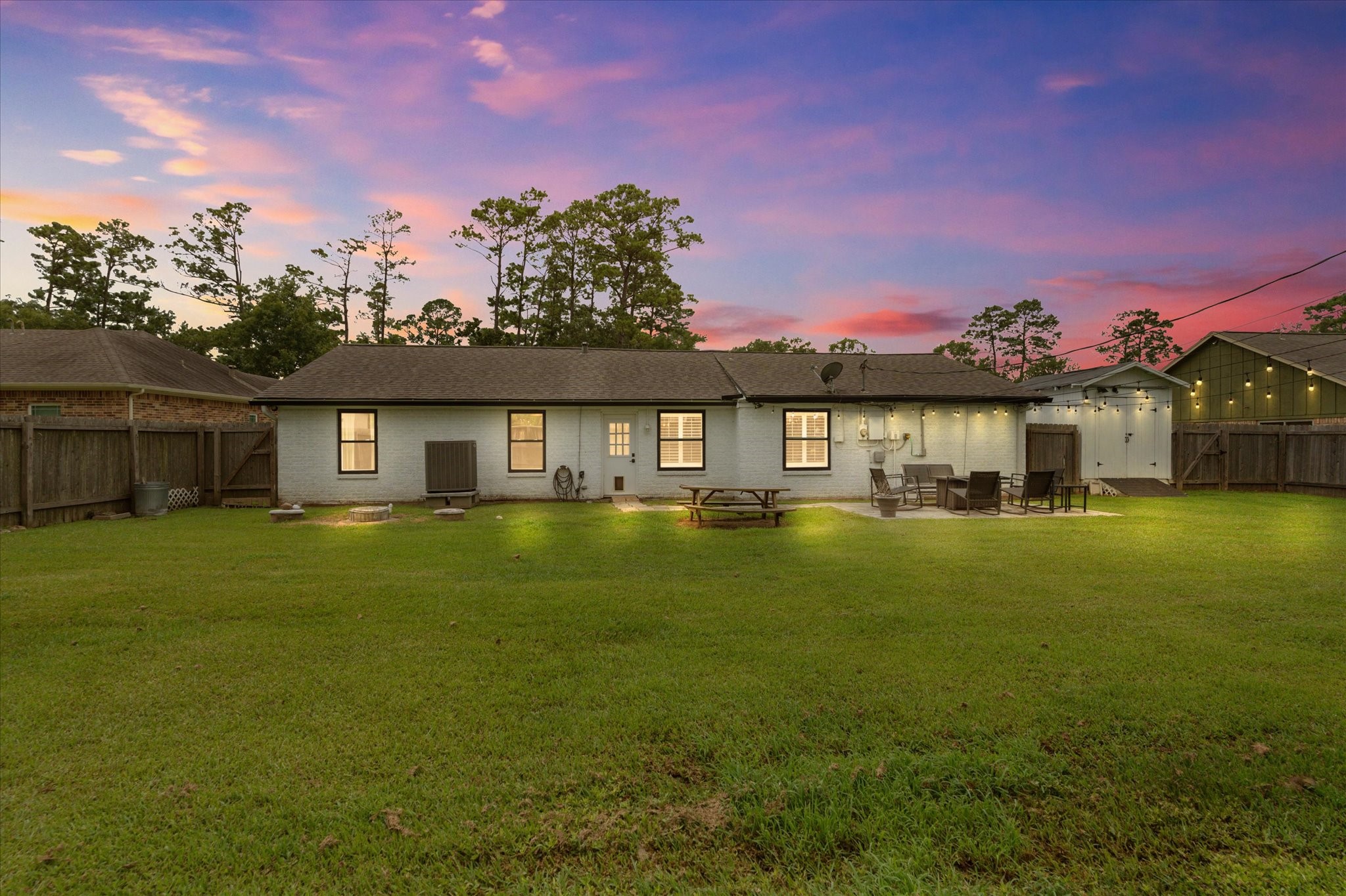 110 Dozent Lane Baytown, TX 77521 - Photo 35 of 36 Expansive backyard perfect for outdoor activities and relaxation.