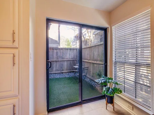 a garden view with a potted plant