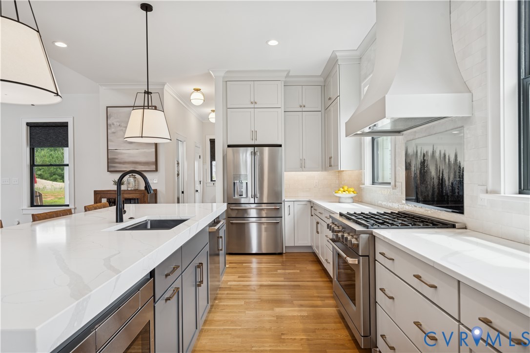 1551 Smokey Rdg Road Maidens, VA 23102 - Photo 11 of 49 a kitchen with stainless steel appliances granite countertop a sink stove and refrigerator