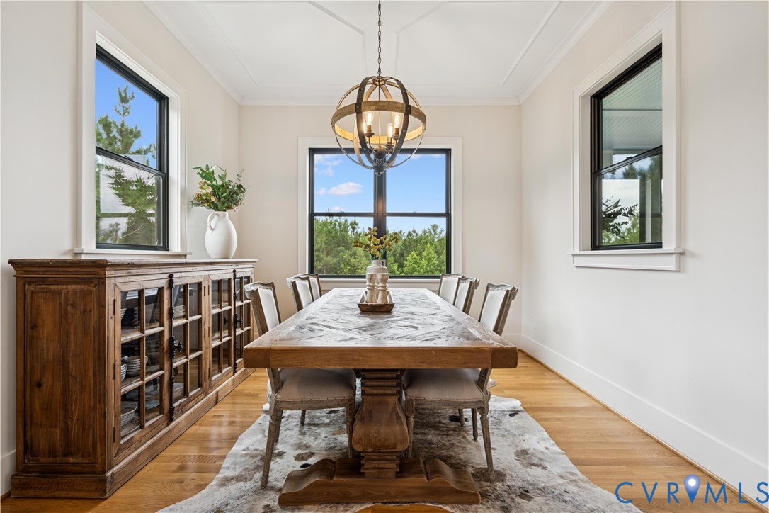 1551 Smokey Rdg Road Maidens, VA 23102 - Photo 14 of 49 a view of a dining room with furniture window and wooden floor