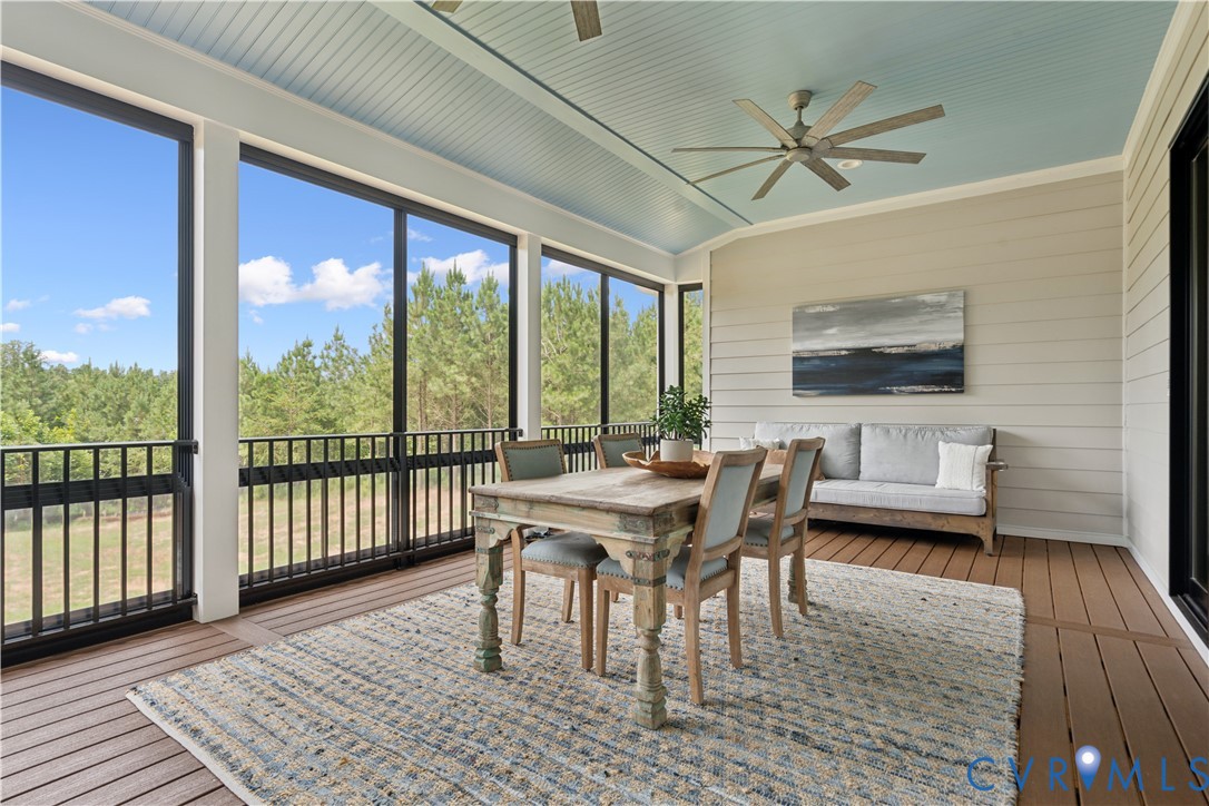 1551 Smokey Rdg Road Maidens, VA 23102 - Photo 15 of 49 a view of a dining room with furniture window and wooden floor