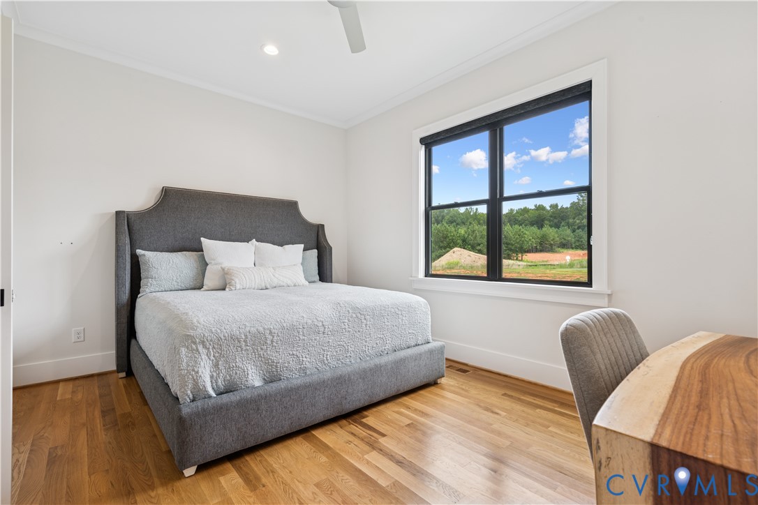 1551 Smokey Rdg Road Maidens, VA 23102 - Photo 28 of 49 a bedroom with a bed and a large window