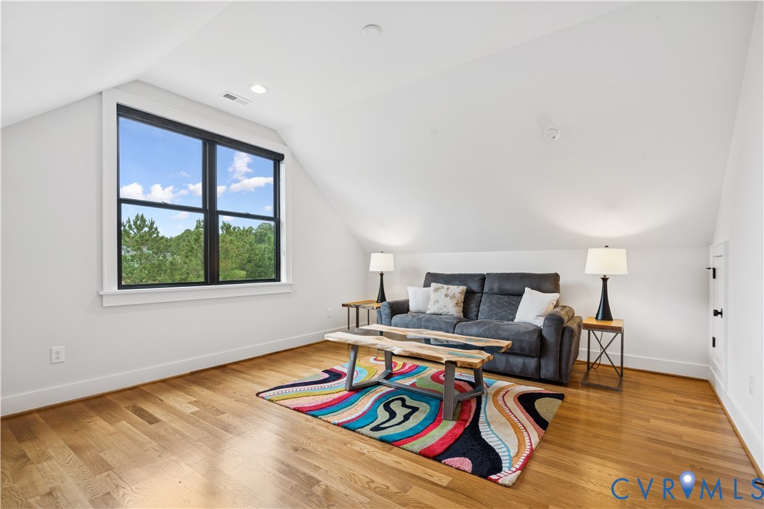 1551 Smokey Rdg Road Maidens, VA 23102 - Photo 35 of 49 a bedroom with furniture and a wooden floor