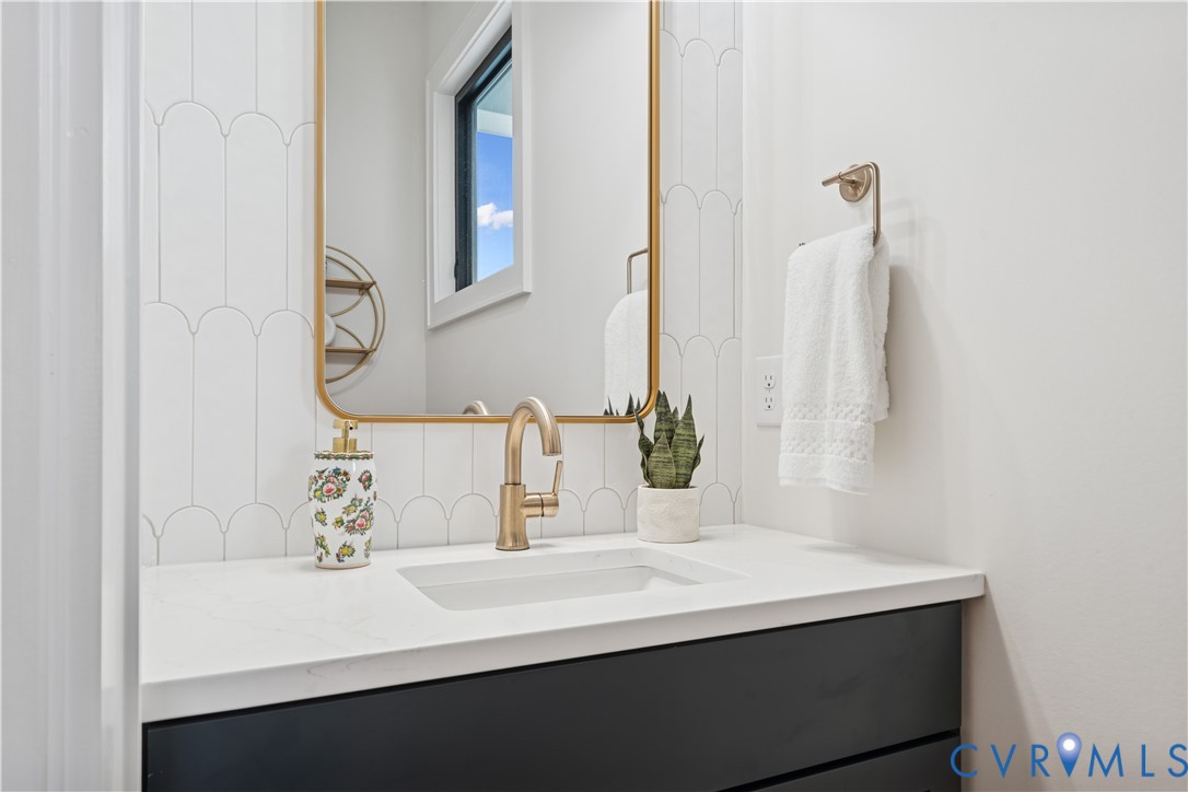 1551 Smokey Rdg Road Maidens, VA 23102 - Photo 36 of 49 a bathroom with a sink and a mirror