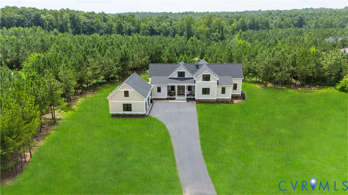 1551 Smokey Rdg Road Maidens, VA 23102 - Photo 46 of 49 a front view of a house with a yard
