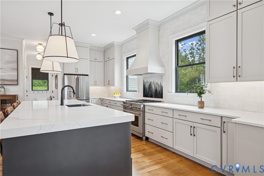 1551 Smokey Rdg Road Maidens, VA 23102 - Photo 10 of 49 a kitchen with kitchen island white cabinets with a sink and dishwasher
