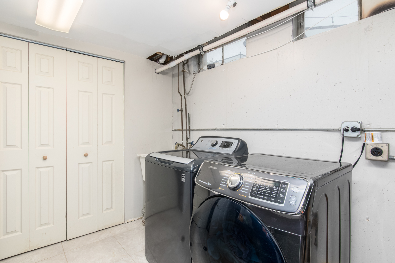 2005 Cayuga Lane Mount Prospect, IL 60056 - Photo 22 of 28 a utility room with dryer and washer