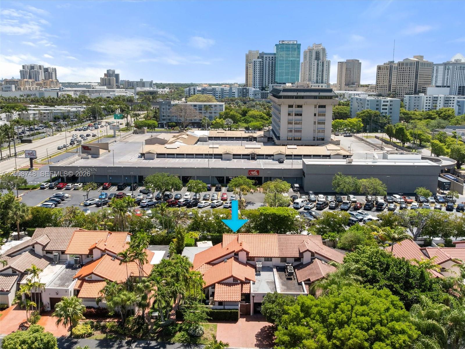 8889 Southwest 78th Court Miami, FL 33156 - Photo 3 of 23 a view of a city and tall buildings