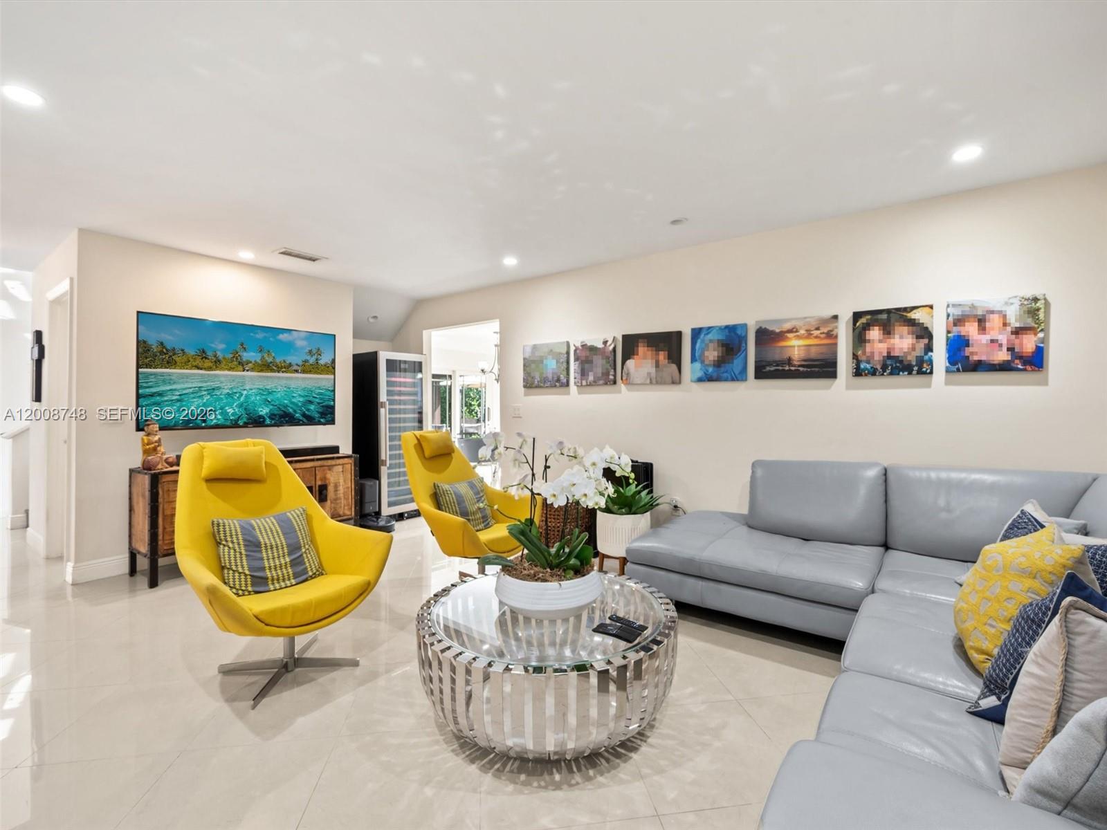 8889 Southwest 78th Court Miami, FL 33156 - Photo 8 of 23 a living room with furniture pool and a large window