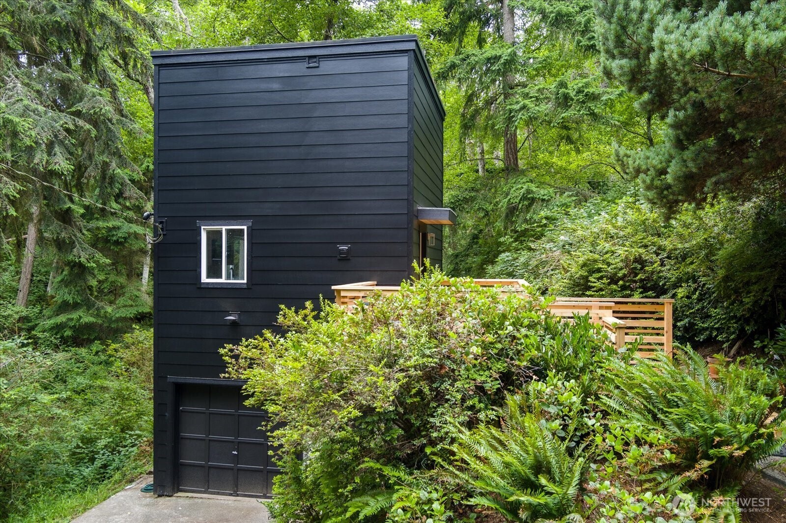 8038 Island Court Clinton, WA 98236 - Photo 3 of 23 a view of a backyard