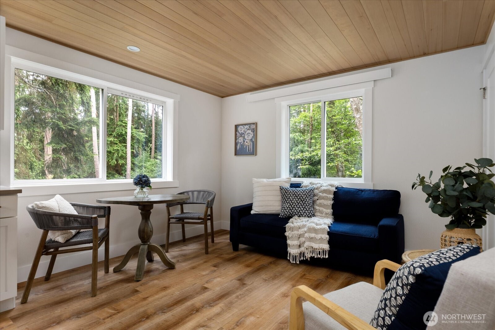 8038 Island Court Clinton, WA 98236 - Photo 6 of 23 a living room with furniture and a large window