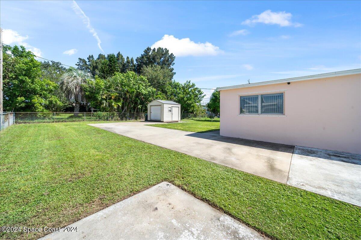 1049 Cable Lane Northeast Palm Bay, FL 32905 - Photo 16 of 24 Side View