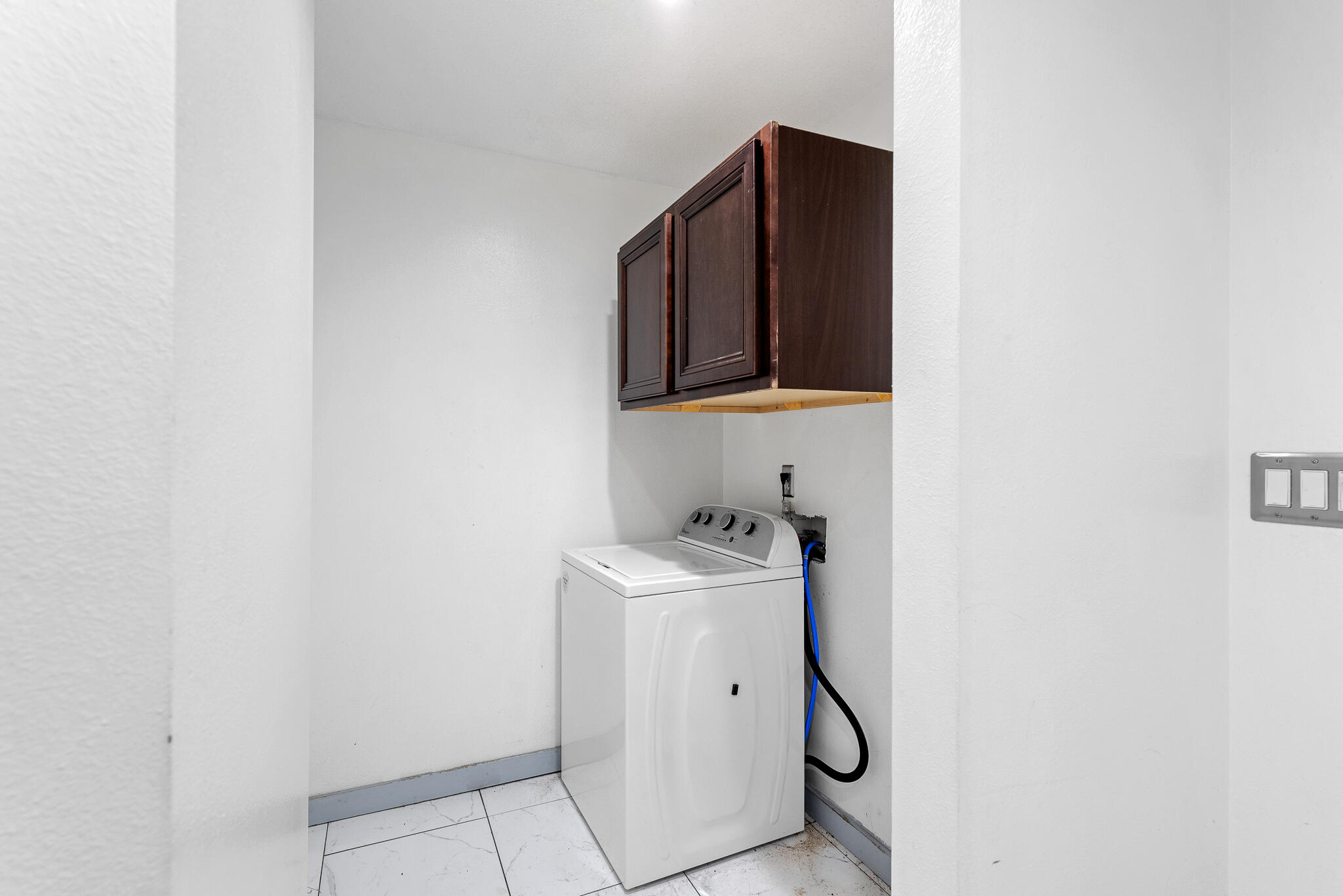 2246 Titanium Drive Crestview, FL 32536 - Photo 13 of 28 a utility room with dryer and washer