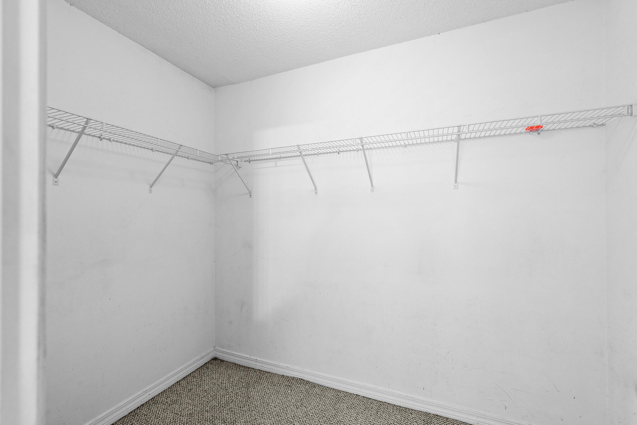 2246 Titanium Drive Crestview, FL 32536 - Photo 20 of 28 a view of a room with racks on the wall