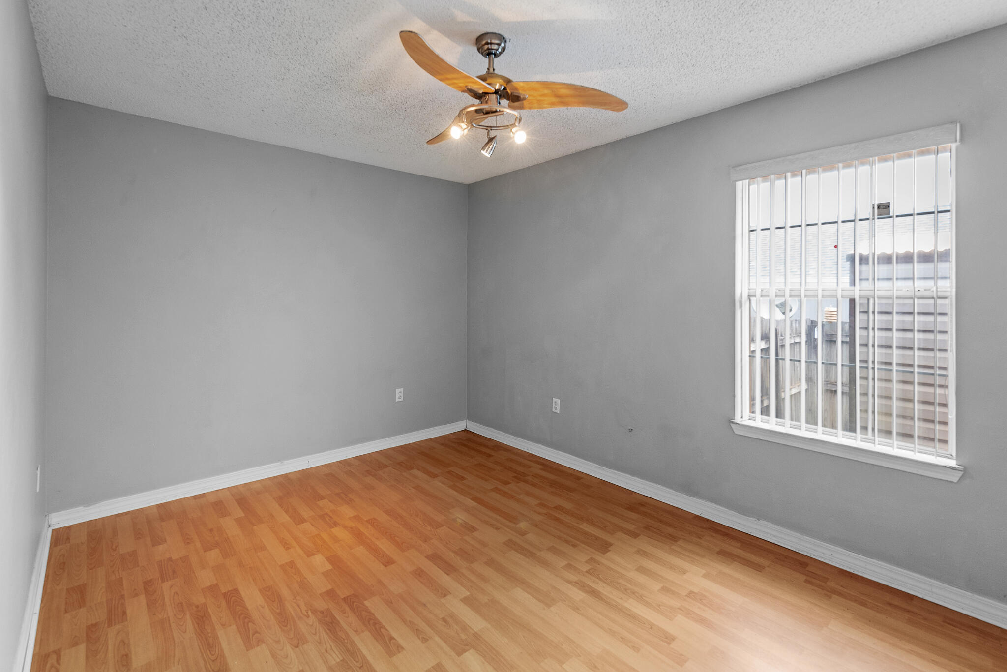 2246 Titanium Drive Crestview, FL 32536 - Photo 23 of 28 an empty room with a window