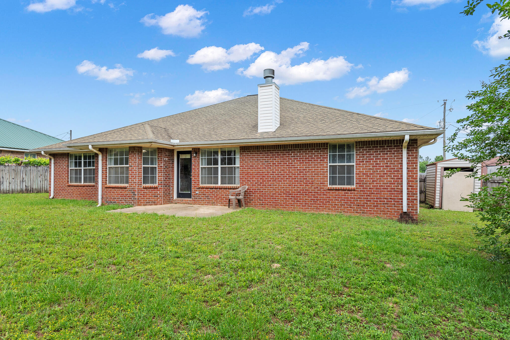 2246 Titanium Drive Crestview, FL 32536 - Photo 28 of 28 a view of a house with a backyard