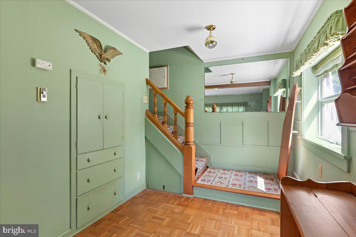 133 Woosamonsa Road Pennington, NJ 08534 - Photo 21 of 27 a view of entryway with a window and wooden floor