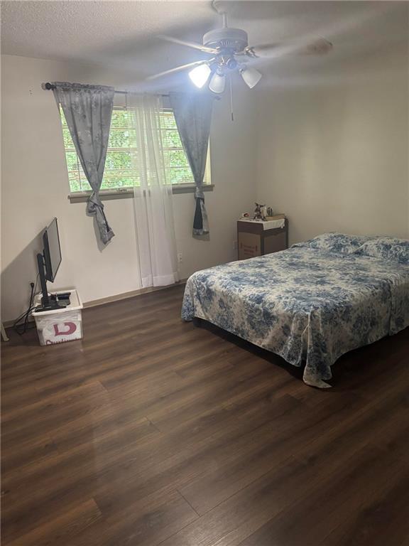 4701 Flat Shoals Road, Unit 41G Union City, GA 30291 - Photo 13 of 16 a bedroom with a bed window and dresser