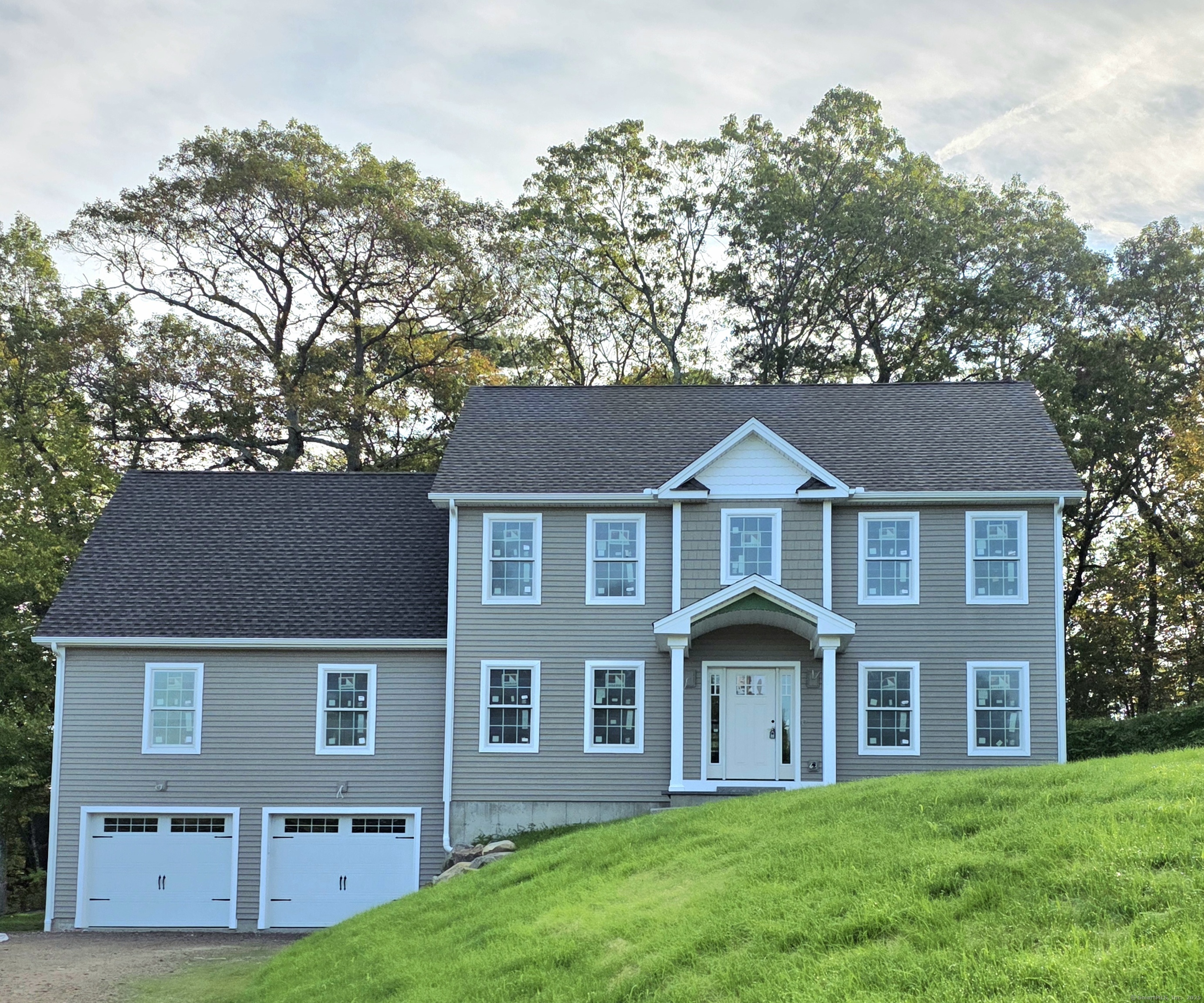 26 Green Street Ellington, CT 06029 - Photo 1 of 1 front view of a house with a yard