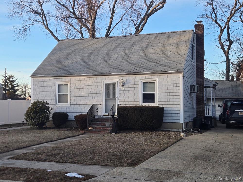 12 Carson Street Bethpage, NY 11714 - Photo 2 of 33 a view of a house with a yard