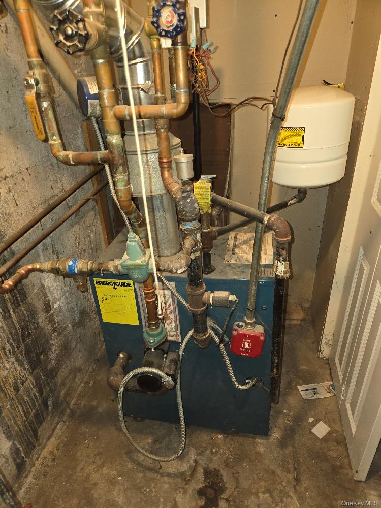 12 Carson Street Bethpage, NY 11714 - Photo 29 of 33 a view of a room with gym equipment