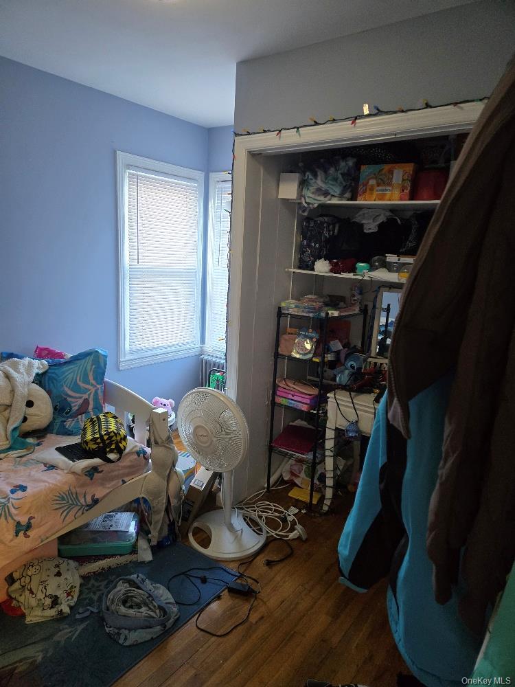 12 Carson Street Bethpage, NY 11714 - Photo 8 of 33 a room with furniture and wooden floor