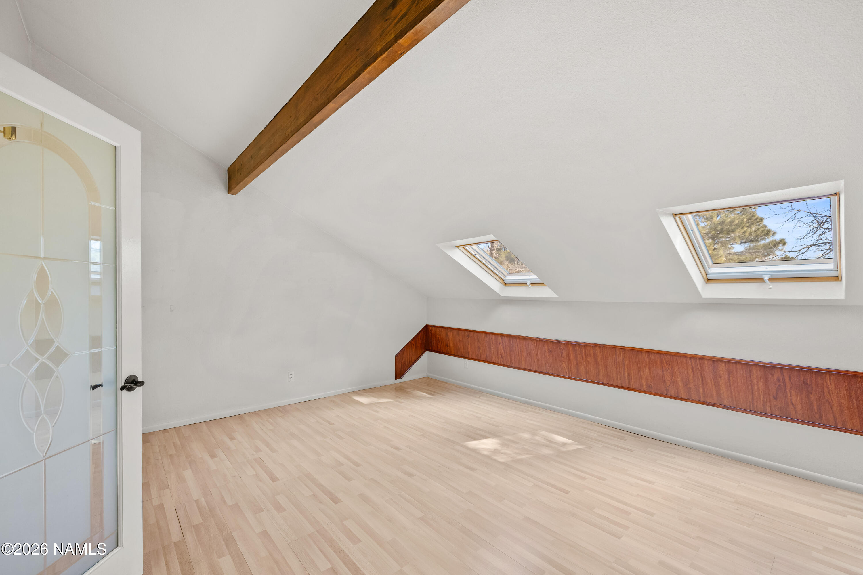 3971 North Swiss Road Flagstaff, AZ 86004 - Photo 25 of 43 a view of a room with wooden floor and windows