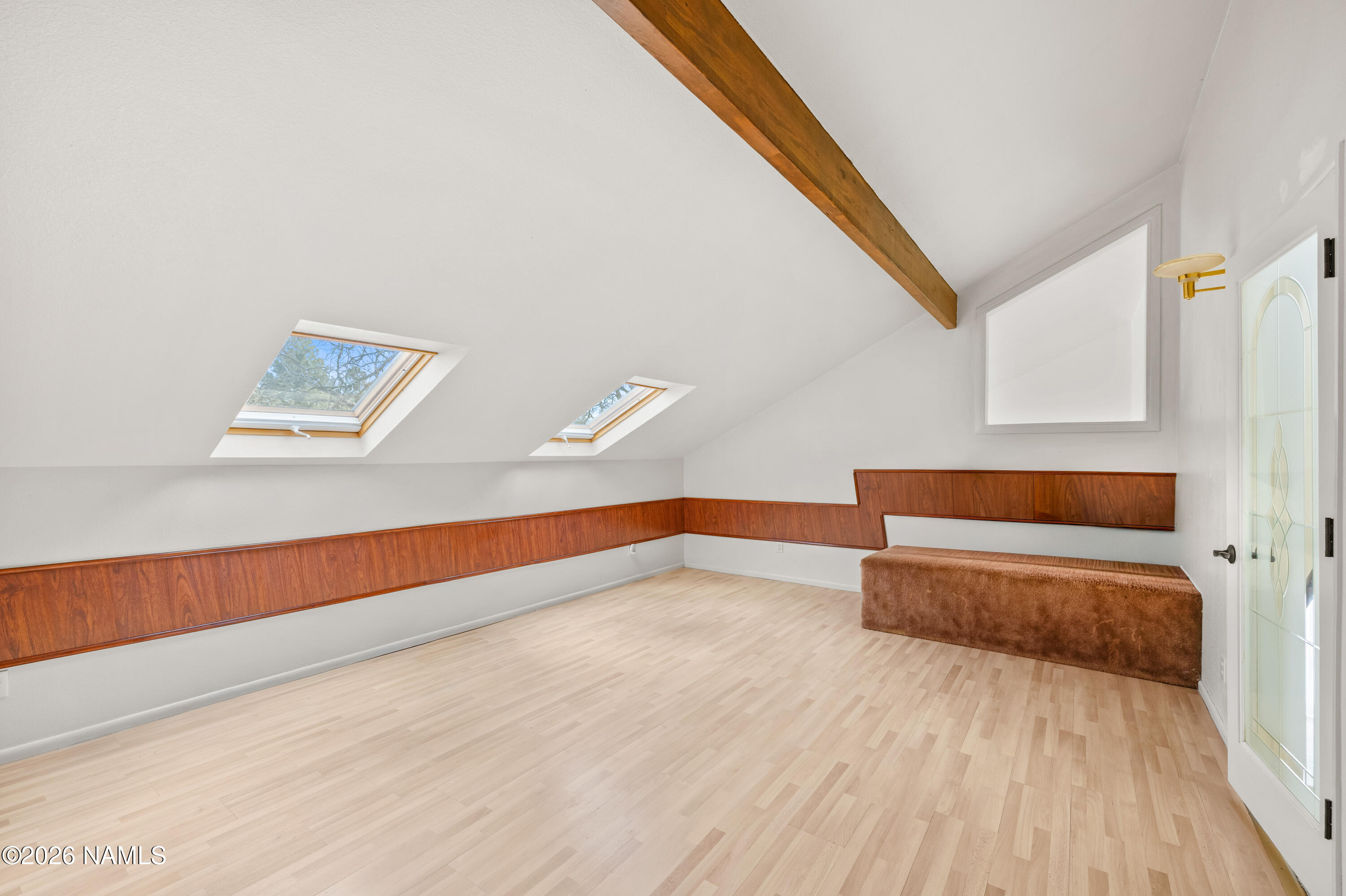 3971 North Swiss Road Flagstaff, AZ 86004 - Photo 26 of 43 a view of an empty room with wooden floor