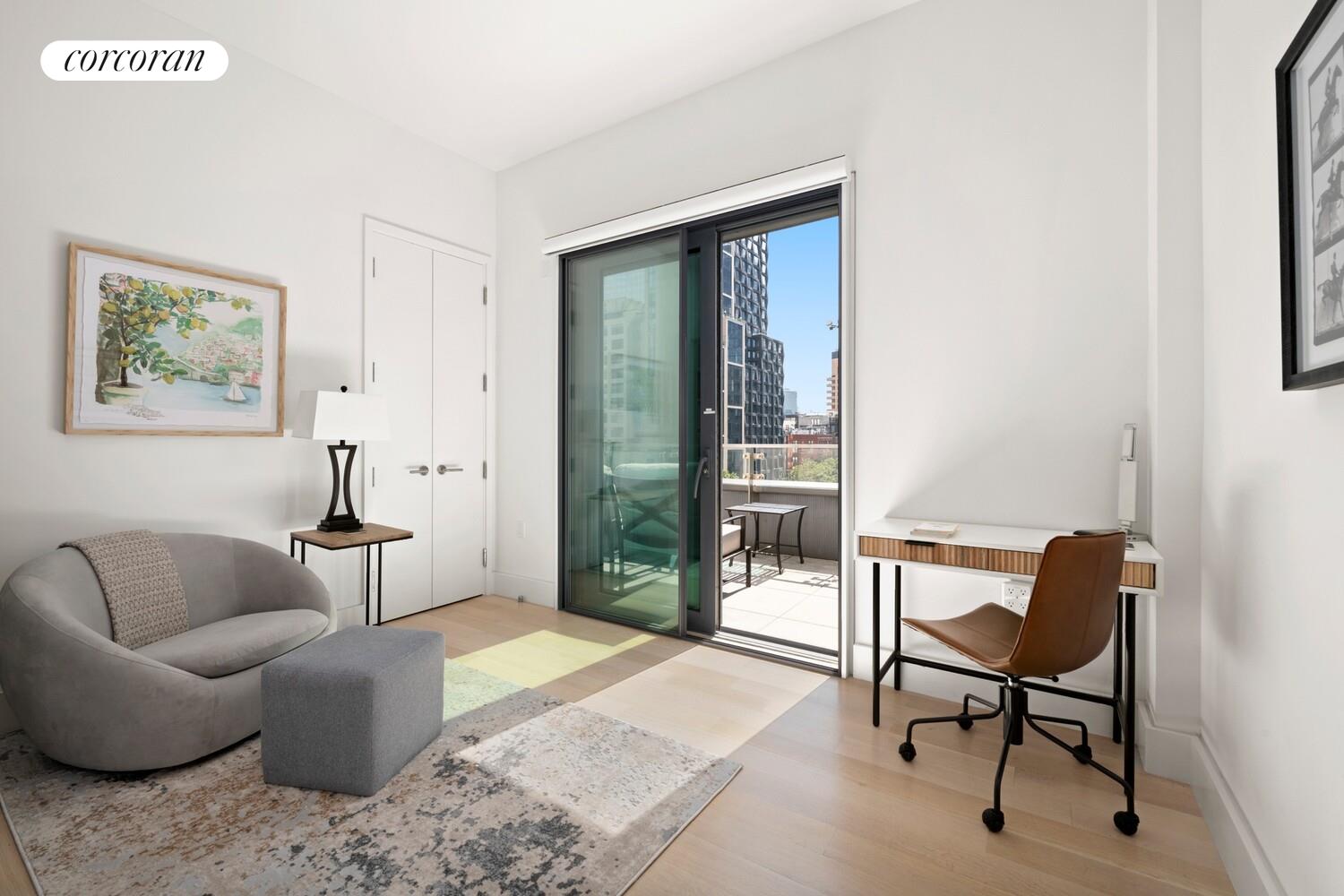 219 Hudson Street, Unit 6D Manhattan, NY 10013 - Photo 13 of 16 a living room with furniture and a window