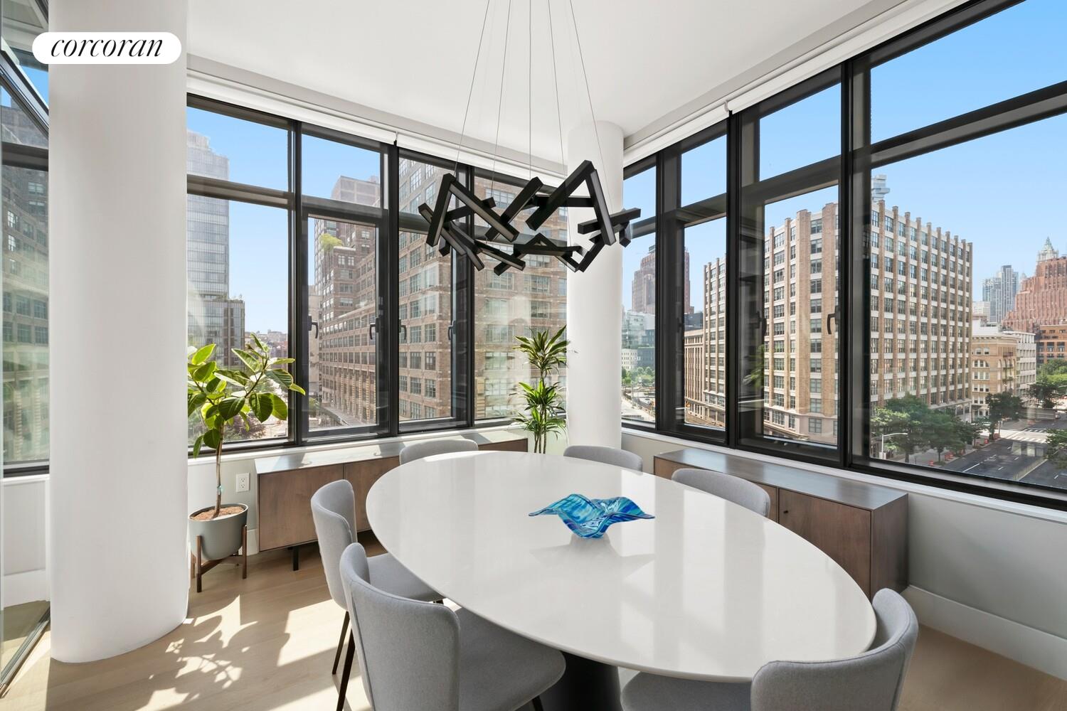 219 Hudson Street, Unit 6D Manhattan, NY 10013 - Photo 3 of 16 a dining room with furniture and window