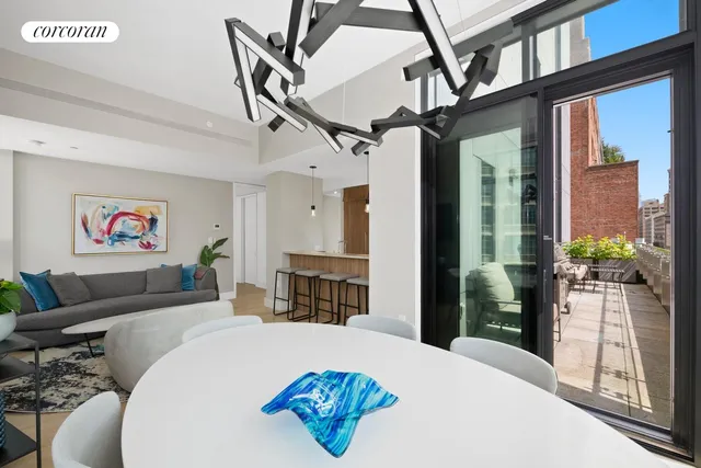 a bathroom with a granite countertop sink a vanity and a bathtub
