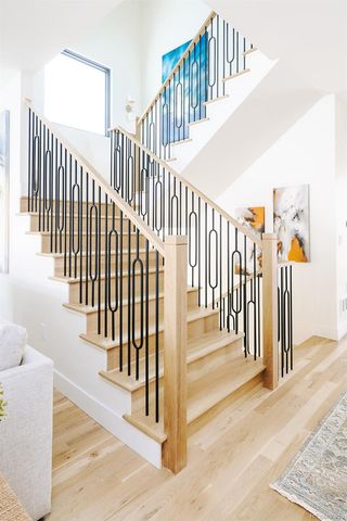a view of staircase with lots of trees in the background