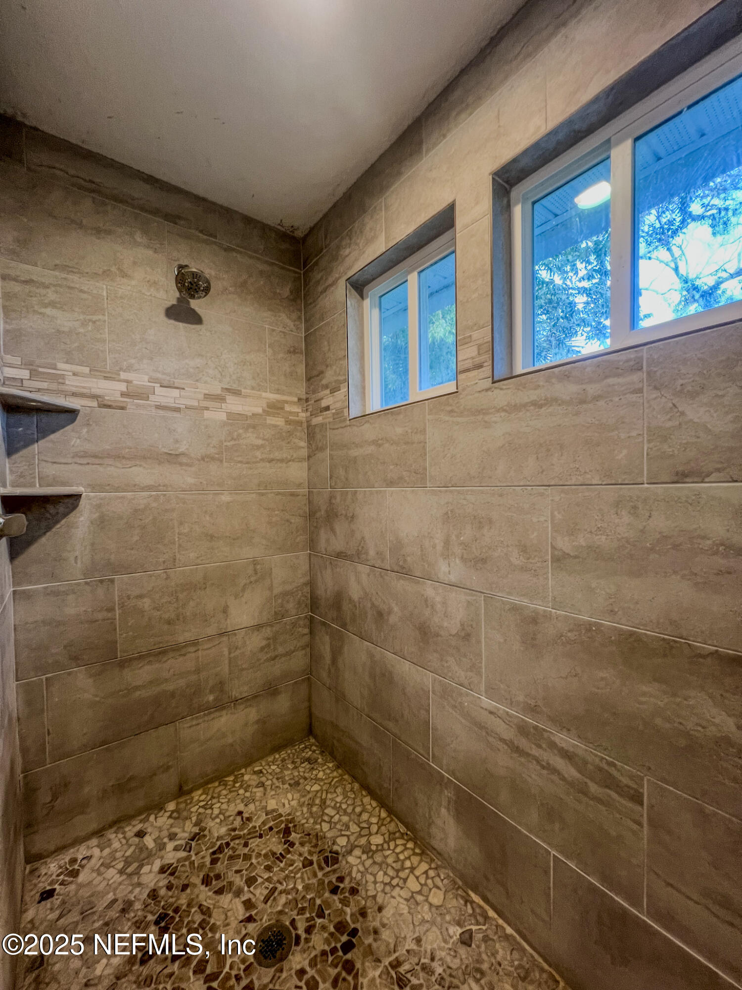 4325 Appleton Avenue Jacksonville, FL 32210 - Photo 19 of 40 a bathroom with a shower