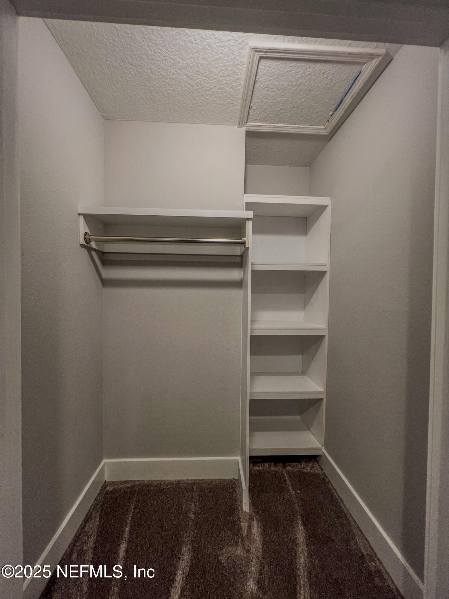 4325 Appleton Avenue Jacksonville, FL 32210 - Photo 27 of 40 a view of a room with rack on the wall